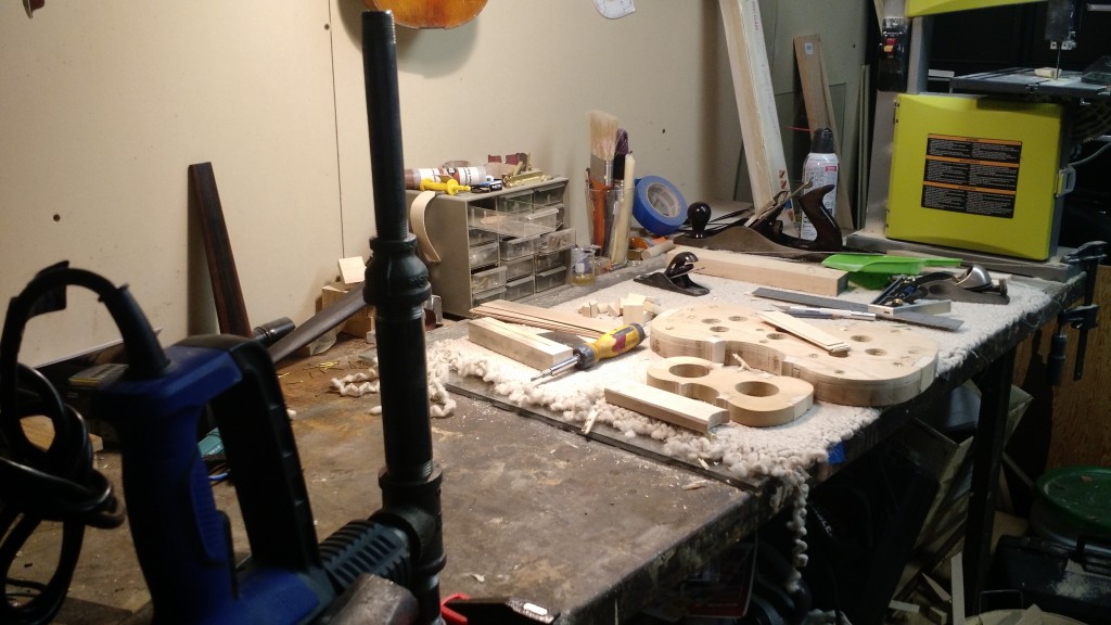 The bending iron is in the foreground. Also, note how organized the workbench is compared to the shots from the end of the weekend.